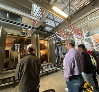 A group of students and staff touring the Energy Center. 