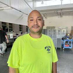 Image of gentleman with bright green shirt
